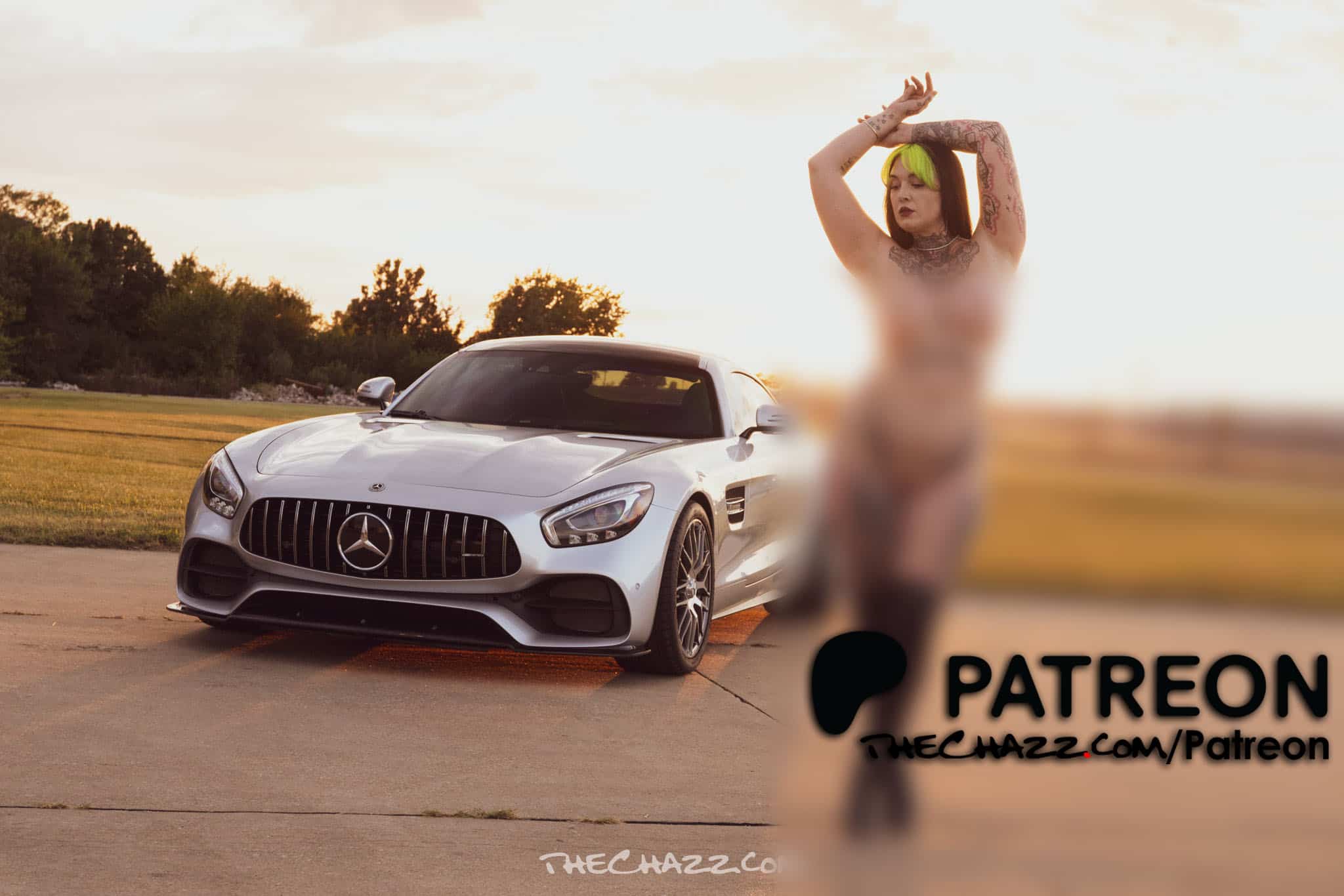 Mercedes-Benz sports car with a topless model during sunset, focusing on luxury and automotive beauty.